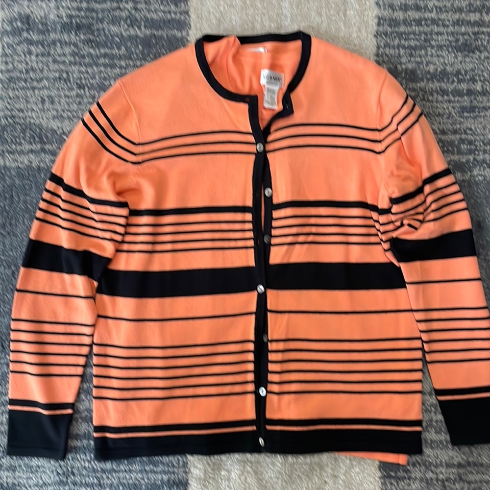 Liz Baker orange and black sweater and tee combo